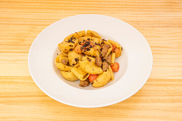 Paccheri is a type of very large tube-shaped pasta, originally from Campania. They are generally smooth, but there is also a ribbed version, paccheri millerighe.