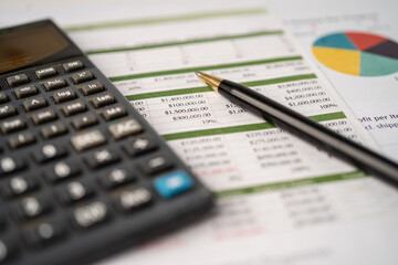 Calculator on spreadsheet paper. Finance development, Banking Account, Statistics, Investment Analytic research data economy, Stock exchange trading, Business company concept.
