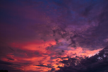 Fototapeta premium Purple sunset on sky. Natural background, dramatic sky.