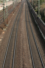 Fototapeta na wymiar Railway track in a stone bed