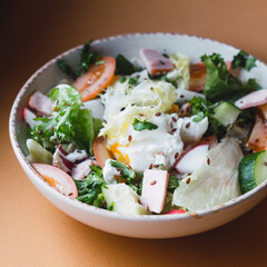 salad with chicken, eggs and vegetables