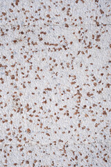White and brown small pebble wall texture background. Interior or exterior decoration quality materials.
