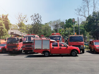 Fototapeta premium Long life red fire and emergency vehicles