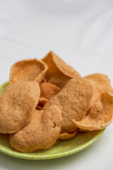 A plate of crispy Thai tapas, fried shrimp chips