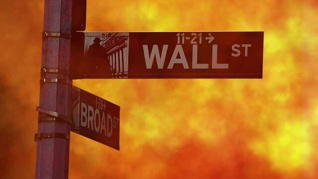 An abstract concept of a global economic and financial crisis with the Wall Street signpost engulfed in orange smoke and burning embers.