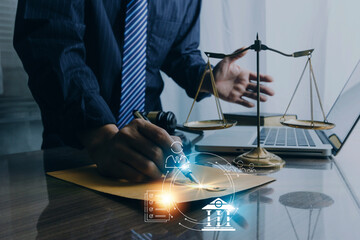 Male lawyer working with contract papers and wooden gavel on tabel in courtroom. justice and law ,attorney, court judge, concept.