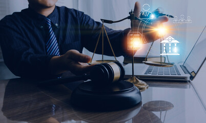 Male lawyer working with contract papers and wooden gavel on tabel in courtroom. justice and law ,attorney, court judge, concept.