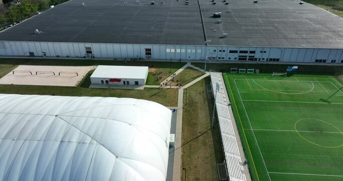 Womens field hockey home headquarters in Manheim Pennsylvania USA. Aerial at Nook Sports. Players entrance practice field.