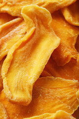 Dried sweet mango fruit slices as textural orange