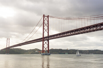 25th of April bridge and Christ the King statue, in Lisbon - Portugal