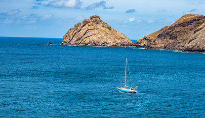 sailboat leaving the harbor