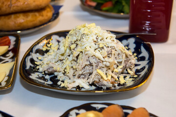 Oriental dishes on a national holiday. A table with food in a restaurant.