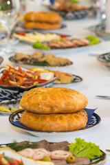 Oriental dishes on a national holiday. A table with food in a restaurant.