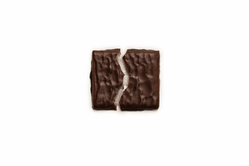 Dark chocolate candies isolated on white background.