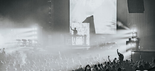 Live Music Performance Panorama with Large Crowd in Black and White
