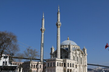 Fototapeta na wymiar Historical Ortakoy Mosque and a fantastic ferry from Istanbul