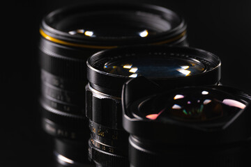 Camera lens on black background