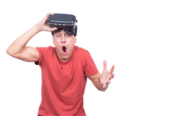 Shocked man in VR headset looking at camera
