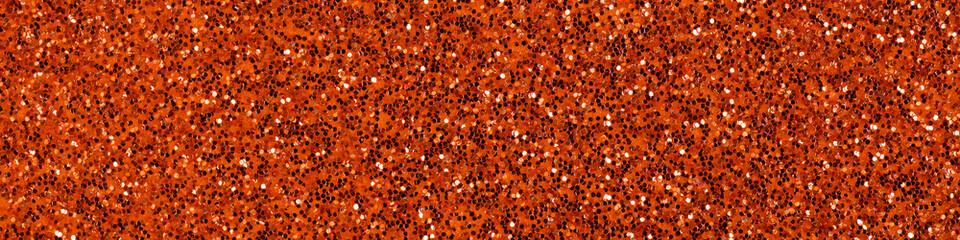 shining uniform background of golden sand, colored sand paper textured background, banner