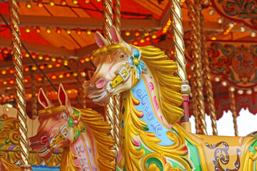Fototapeta na wymiar Horse on a vintage merry go round