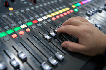 Professional audio mixing console. ​Mixer. Pro audio mixing board faders and knobs. Static shot...