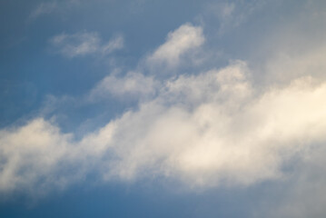 Gray-blue dark leaden clouds with snow in soft focus . Snow charge, snowfall expected, cold atmospheric front. Winter, spring clouds. Picture for weather forecast.
