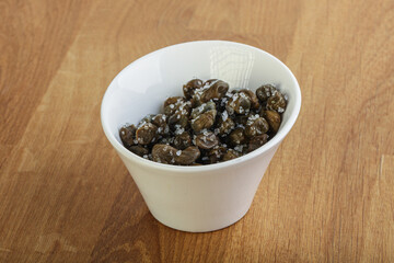 Salted marinated capers snack appetiser