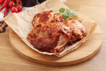 Marinated chicken leg in tomato sauce