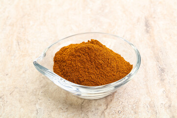 Dry Paprika powder in the bowl
