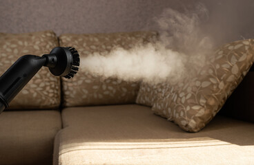 Cleaning furniture with a steam cleaner
