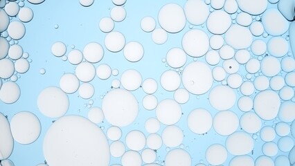 Light grey different sized bubbles floating in clear liquid on pale blue background | Background for skin care cosmetic products