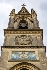 Fototapeta na wymiar Clocher de l'Église Saint-Roch d'Aiguèze par temps nuagueux (Occitanie, France)
