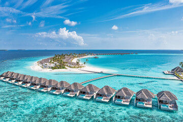 Maldives paradise island. Tropical aerial landscape, seascape with jetty, water bungalows villas...