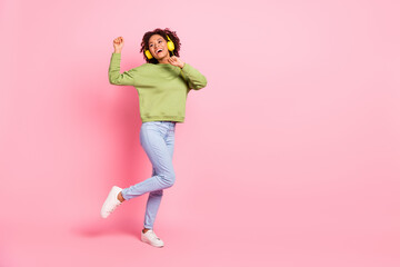 Fototapeta na wymiar Full length body size view of attractive funky cheerful girl listening hit dancing having fun isolated over pink pastel color background