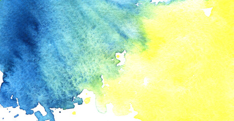 Abstract real watercolor background. Yellow spot iridescently flowing into blue blot. Bicolor Grab. Lots of small splashes. Chaotic colored splashes on white background. Hand drawn on textured paper.