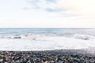 Fototapeta na wymiar Seascape. Pebbles on the beach