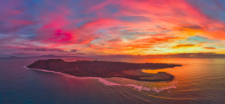 Dramatic colourful aerial panoramic sunrise image, Corralejo, Fuerteventura