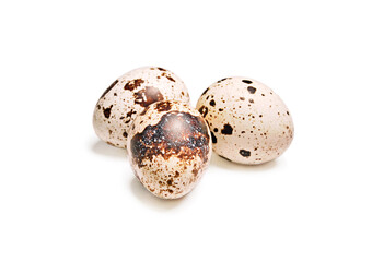 A group of quail eggs isolated on white background