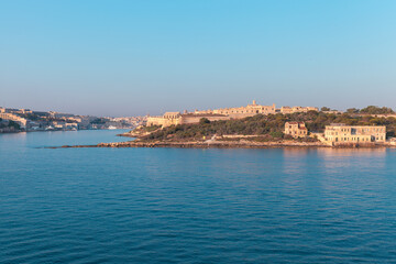 Fototapeta na wymiar Manoel Island, Malta. Summer coastal landscape with old fortifications