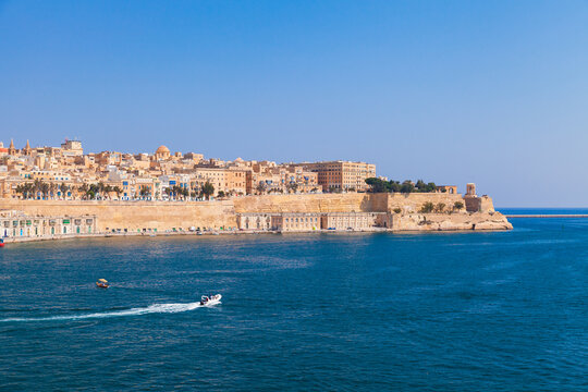 Valletta, Malta. Coastal view with motorboat
