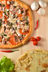 Delicious fresh pizza served on wooden table