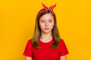 Photo of nice small girl wear red t-shirt headband isolated on yellow color background