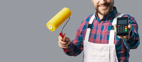 Professional painter holding a POS terminal