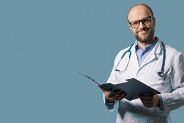 Confident doctor holding medical records