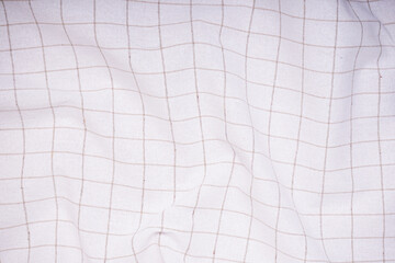 Close-up of vintage checkered towel - textured background. Top view.