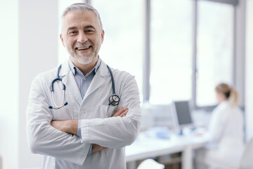 Confident doctor posing with arms crossed
