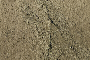 Grunge old worn gray plaster on the wall with space for text or image.