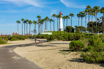 Lighthouse with palms at Long Beach, California, USA - obrazy, fototapety, plakaty