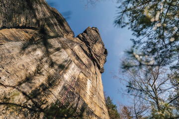Epic sport climbing on giant sandstone cliffs of Elbe sandstone towers. Adventorous traditional Czech climbing on Sandstone.