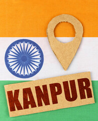 On the Indian flag, a geolocation symbol and a sign with the inscription - Kanpur
